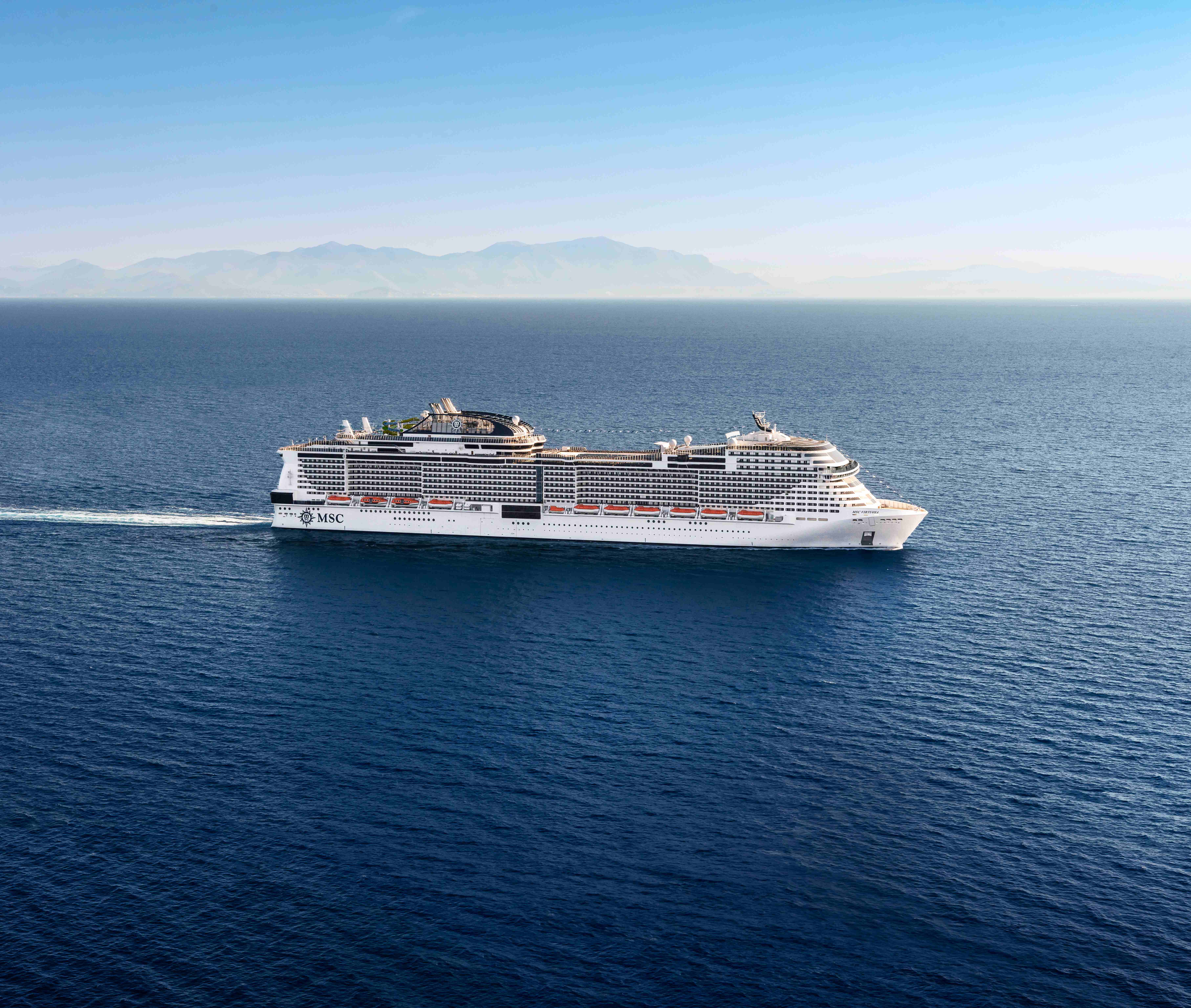 MSC Cruise Ship with mountain backdrop